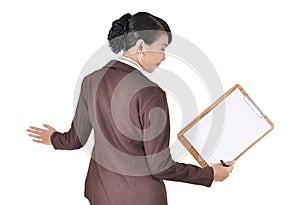 Pose businesswoman carrying blank folder