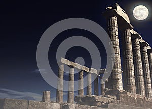 Poseidon`s Temple at Cape Sounion under full moon - Attica, Greece