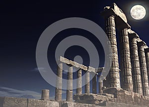 Poseidon`s Temple at Cape Sounion under full moon - Attica, Greece photo