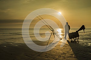 Posing fisherman at sunrise