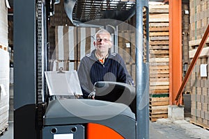 Posing reach truck driver