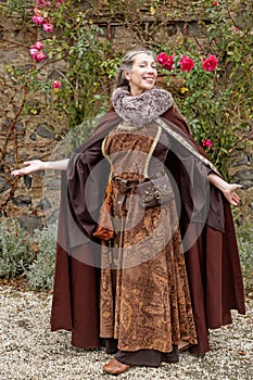 Posing robed Lady photo