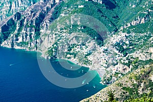 Positano with the beach and houses, located on the rock, Amalfi coast, Italy.