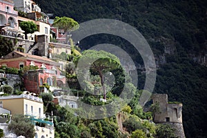 Positano houses on steep hill with tower