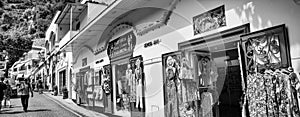 Positano, Italy - June 29, 2021: Tourists along the city colorful streets in summer season