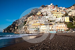 Positano - Morning view from Fornillo Beach on colorful building of coastal town Positano at Amalfi Coast, Italy. No people