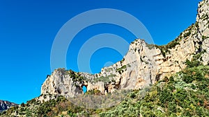 Positano - Scenic view on rock formation Montepertuso Il Buco in Positano and Praiano, Amalfi Coast, Campania, Italy, Europe.