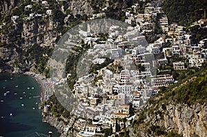 Positano. View from above of the large beach and the village that climbs the hill