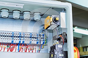 Position switch, a master switch and bushing terminals in electrical cabinet.