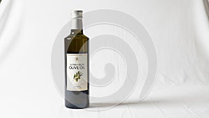 Positioned centrally casting a subtle shadow on the plain backdrop