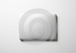 Is positioned centrally, casting a subtle shadow, suggesting a light