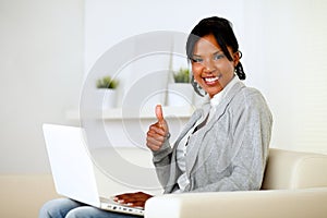 Positive afro-american woman looking to you