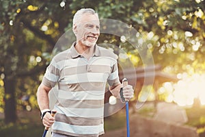 Positive aged man enjoying physical exercise