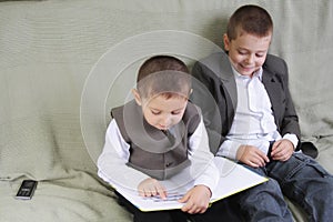 Positive brothers reading book