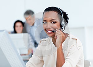 Positive business partners working at computers