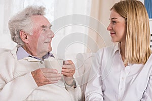 Positive caregiver and content senior