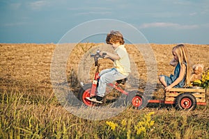 Positive children. Copy space. Little kid outdoor. Happy girl and boy in the field. Children play outdoors. Little girl