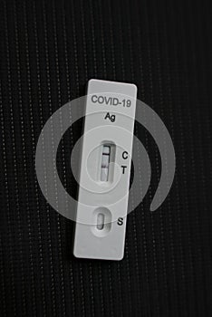Positive Covid 19, SARS CoV 2, Corona antigen test kit for self testing, one step coronavirus antigen rapid test, close up with