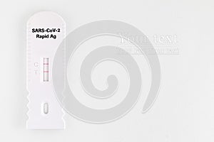 Positive covid test. Test results for Covid-19. rapid test on a white background. SARS-CoV-2 Ag Rapid Antibody Test Kit.