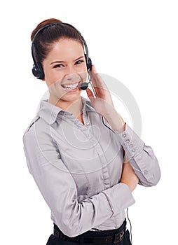 Positive customer rep. a young customer service representative wearing a headset and laughing isolated on white.