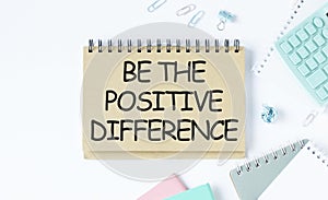 positive difference text on notepad on white table