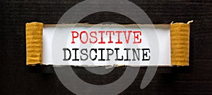 Positive discipline symbol. Concept words Positive discipline on beautiful white paper. Beautiful black paper background. Business