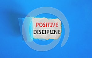 Positive discipline symbol. Concept words Positive discipline on beautiful white paper. Beautiful blue paper background. Business