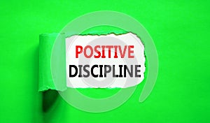 Positive discipline symbol. Concept words Positive discipline on beautiful white paper. Beautiful green paper background. Business