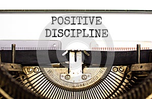 Positive discipline symbol. Concept words Positive discipline typed on beautiful old retro typewriter. Beautiful white paper