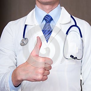 Positive doctor showing thumb up