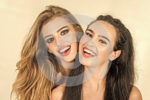 Positive fashion portrait of two girls