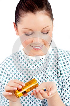 Positive female patient taking pills