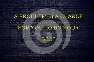 Positive inspiring quote on neon sign against brick wall a problem is a chance for you to do your best