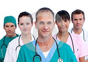 Positive male doctor and his medical team