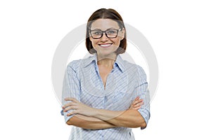 Positive mature woman on white isolated background. Confident female smiling arms crossed, businesswomen, specialist, expert