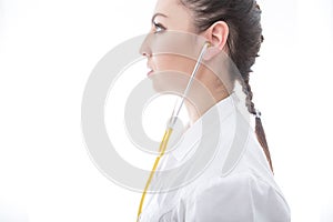 Positive medical doctor woman with stethoscope. Isolated white b