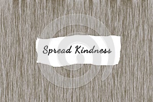 Positive message on wood wall - Spread Kindness. Humanity, be good, be kind concept. Note to self.