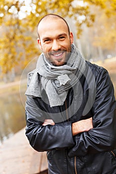 Positive middle-aged man on autumn day