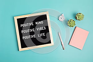 Positive mind, vibes, life motivational quote on the letter board. Inspiration text