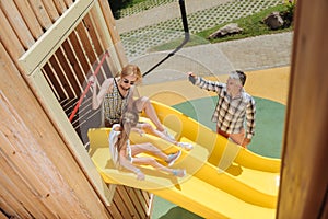 Positive nice family being on the playground