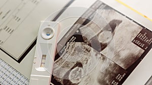 positive pregancy test with ultrasound photo