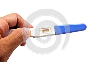 Positive pregnancy test result, hand holding pregnancy test