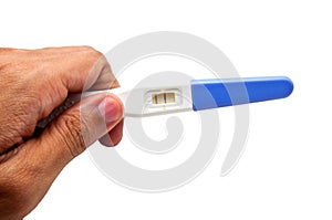 Positive pregnancy test result, hand holding pregnancy test