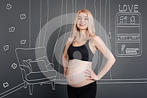 Positive pregnant woman resting at home