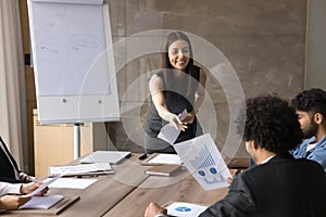 Positive project leader woman holding meeting with business team