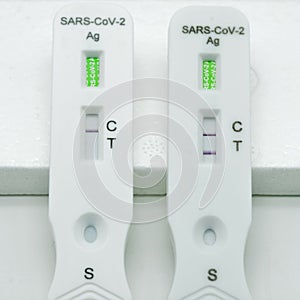 Positive test result from a rapid covid-19 self-test at home photo