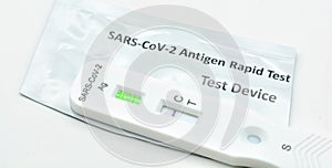 Positive test result from a rapid covid-19 self-test at home photo