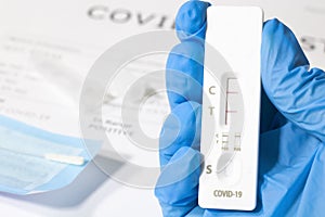 Positive test result using the COVID-19 rapid testing device, antibody sample to the patient's rapid swab serology.