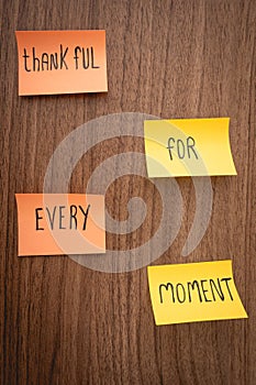 Positive and thankfull notes on a wooden background. Thanksgiving day