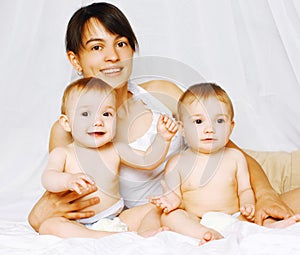 Positive twins and mom in the bed